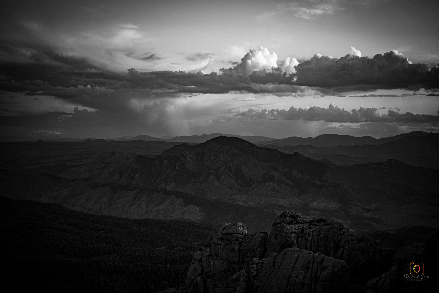 Black and White photograph of a sunset photo at Devils Head fire lookout looking southwest