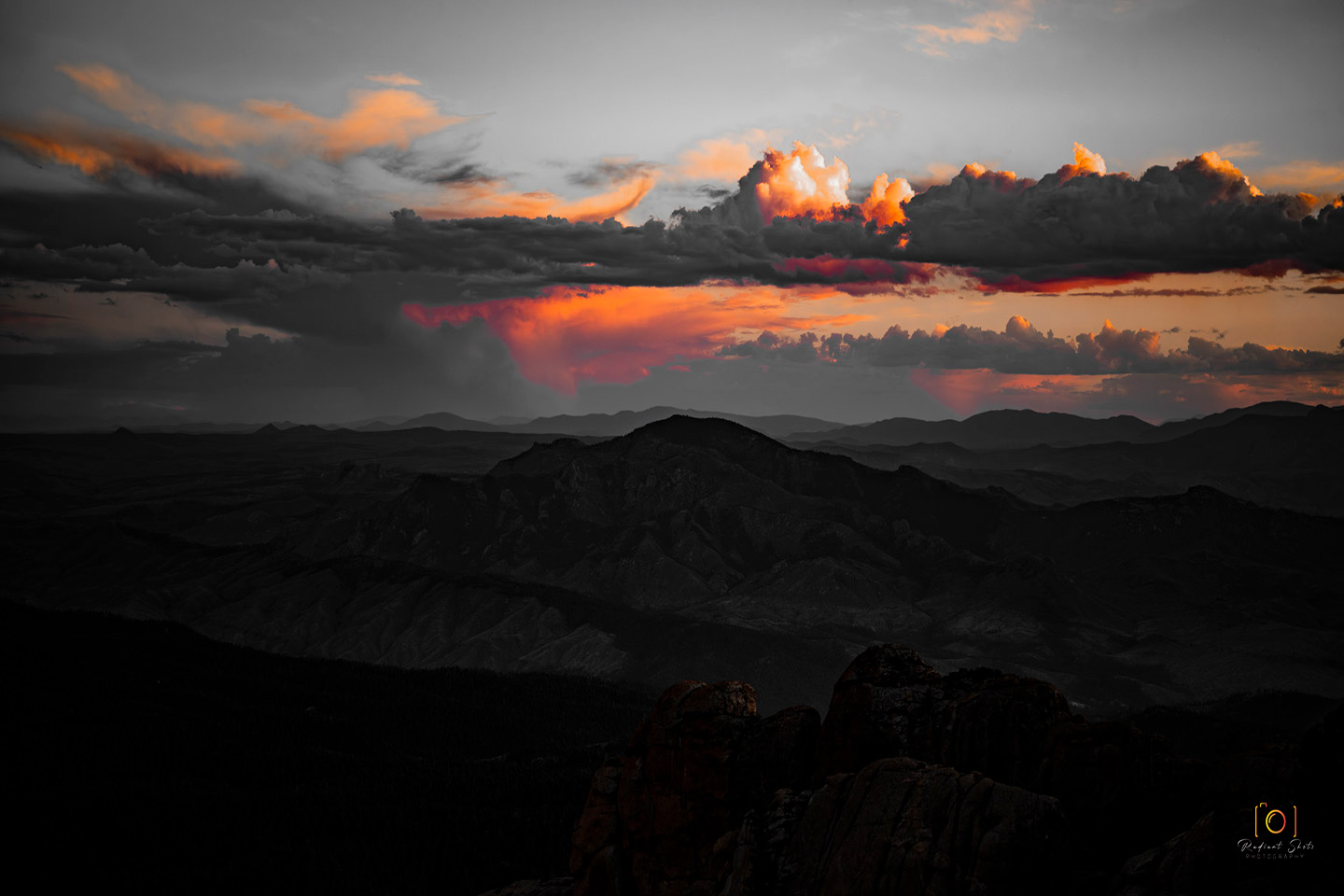 Color photograph of a sunset photo at Devils Head fire lookout looking southwest